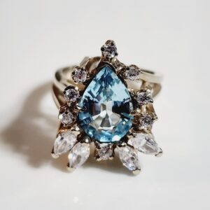 14KT White Gold Pear Shaped Blue Topaz Accented by Cubic Zirconia Ring Size 8