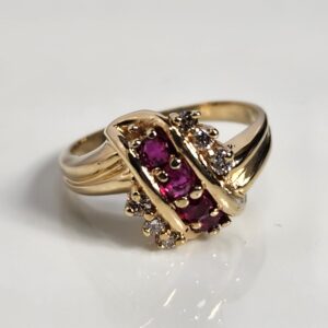 14KT Yellow Gold Ruby Ring Accented With Diamonds Size 5.5
