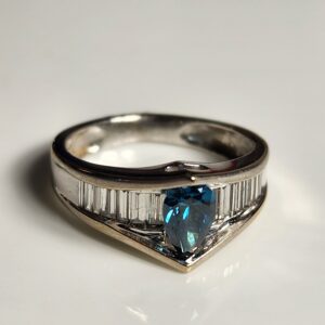 14KT White Gold Pear Shaped Blue Zircon Accented by Baguette Diamonds Size 5.5
