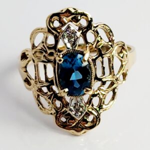 10KT Yellow Gold London Blue Topaz with accent Diamonds Size 8