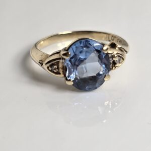 10KT Yellow Gold Oval Blue Topaz with accent Diamonds size 6.5